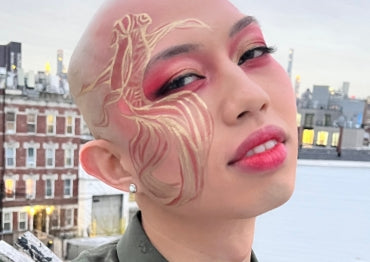 Johnathan Nguyen wears a goldfish-inspired makeup look to celebrate the Lunar New Year